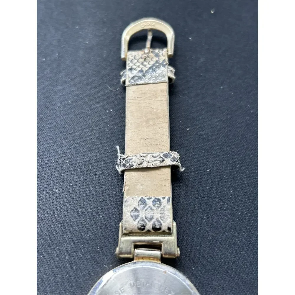 Embassy Gold Tone Snakeskin Type Band Women’s Quartz Watch